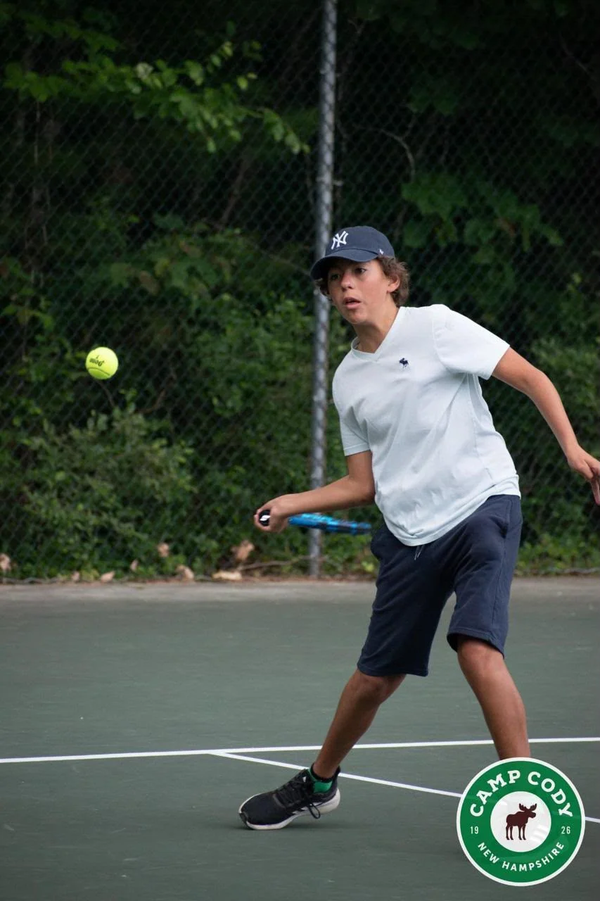 Tennis player preparing a shot on court